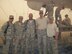 Tech. Sgt. Terrance Williams, center, currently 22nd Security Forces Squadron resources NCO in-charge, poses for a photo July 2011, in Balad, Iraq. Williams deployed nine times during his career, six of which were to combat locations. (Courtesy photo)