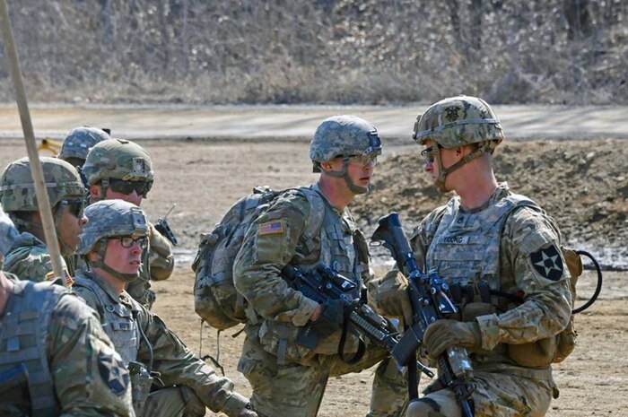 Staff Sergeant Nicholaus Young, C Co. 1st Battalion, 23rd Infantry, 1st Stryker Brigade, 2nd Infantry Division prepares his squad before a live fire exercise at Story Live Fire Complex (SLFC) in South Korea on Mar 14. Exercise Foal Eagle is an annual training exercise enhancing interoperability between U.S. and ROK military forces and developing flexibility to respond to a crisis. 