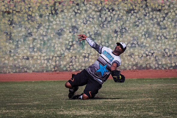 Tyrone Clark makes a sliding catch during a tournament game in the Military Stars & Stripes softball tournament in Las Vegas, Nevada, Sunday, March 19, 2017. Thirteen Schriever members competed in the weekend tournament, earning a fourth place finish in their bracket. The Sentinels are Schriever Air Force Base’s varsity softball team. For more information about the Sentinels, contact Joshua Carter at 567-0361. (Courtesy photo/Joshua Carter)