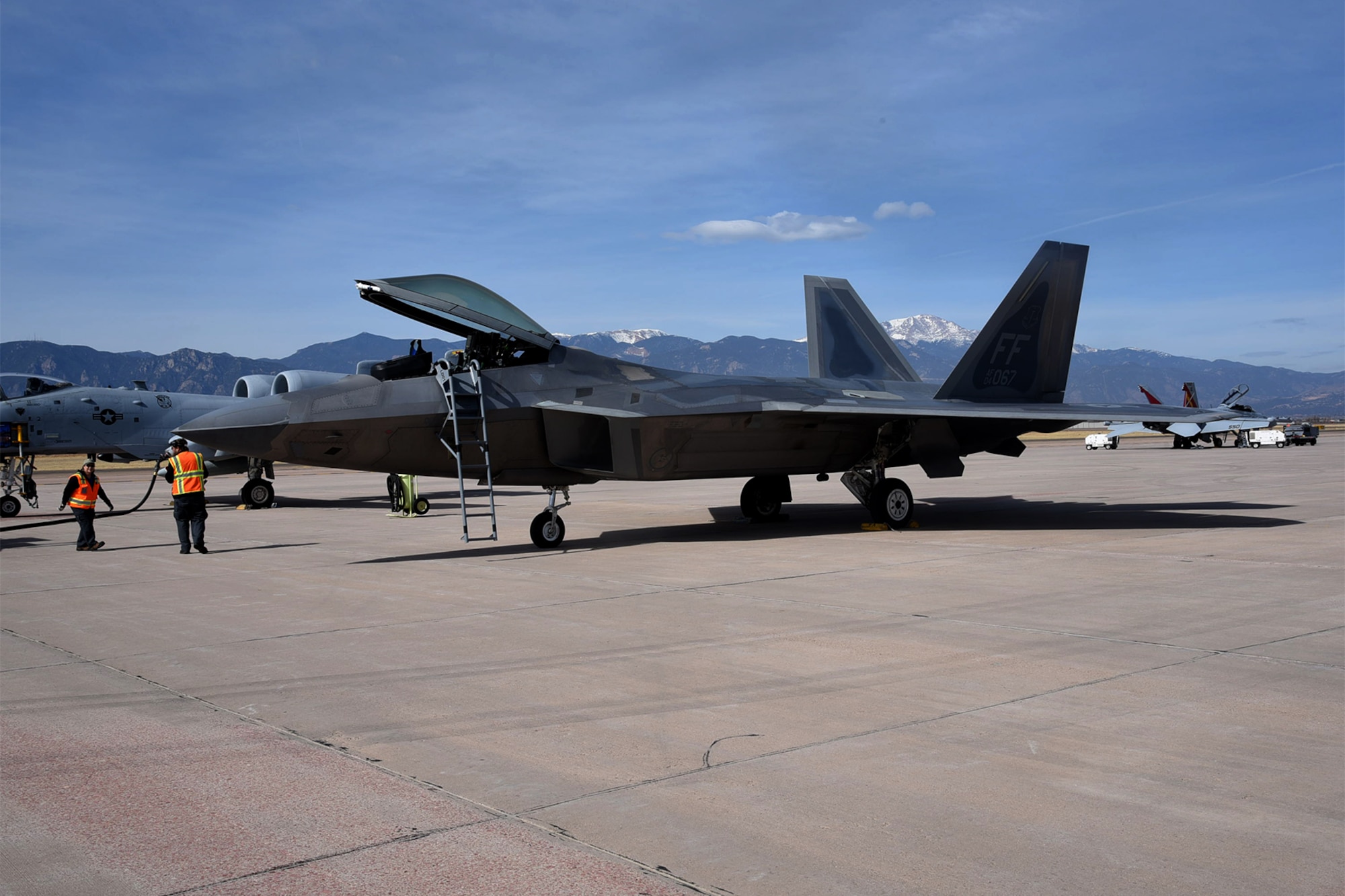 PETERSON AIR FORCE BASE, Colo. – A F-22 Raptor, assigned to the 1st Fighter Wing from Joint Base Langley-Eustis, sits on the Peterson Air Force Base, Colo., flight line, March 17, 2017. The 21st Logistic Readiness Squadron services various military aircraft transitioning or training in the Front Range area. 