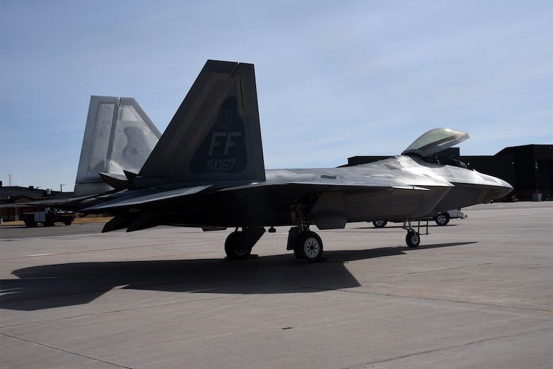 PETERSON AIR FORCE BASE, Colo. – A F-22 Raptor, assigned to the 1st Fighter Wing from Joint Base Langley-Eustis, sits on the Peterson Air Force Base, Colo., flight line, March 17, 2017. The 21st Logistic Readiness Squadron services various military aircraft transitioning or training in the Front Range area. 