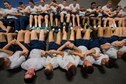 Members of the 790th Missile Security Forces Squadron lock elbows while performing team building sit-ups during squadron physical training on F.E. Warren Air Force Base, Wyo., Feb. 1, 2017. Many of the workouts that are incorporated in the 790th MSFS workout regime are team structured to build esprit de corps among its members. (U.S. Air Force photo by Staff Sgt. Christopher Ruano)