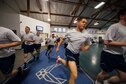 Members of the 790th Missile Security Forces Squadron run “Last Airman Up” on the indoor track during squadron physical training on F.E. Warren Air Force Base, Wyo., Feb. 1, 2017. During the winter months, many squadrons utilize the indoor gym to conduct their squadron PT. (U.S. Air Force photo by Staff Sgt. Christopher Ruano)