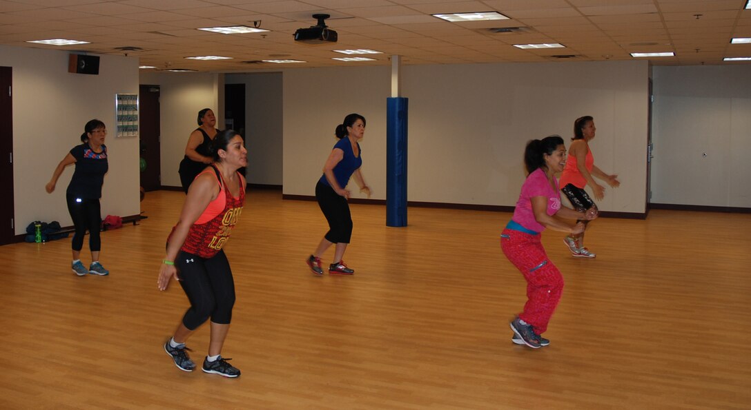 Ana Zavala, second from right, leads a morning Zumba class at the Peterson Fitness Center, March 28, 2017 at Peterson Air Force Base, Colorado. Hers is one of 40-plus classes available each week at the center, said Les Stewart, Fitness Center special programs director. (U.S. Air Force Photo by Dave Smith)