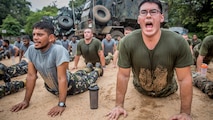 U.S. and Sri Lankan Marines cool down and stretch after conducting physical training as part of a Theater Security Cooperation engagement at Sri Lanka Naval Base, Trincomalee, Nov. 24, 2016. The physical training helped to create tighter bonds between the U.S. and Sri Lankan Marines. This is the Sri Lankan Marines’ first engagement with another Marine Corps as their Corps was stood up within the past four months. Working with foreign militaries provides U.S. Marines and Sailors valuable training with warriors from another culture, and builds camaraderie between partner nations.