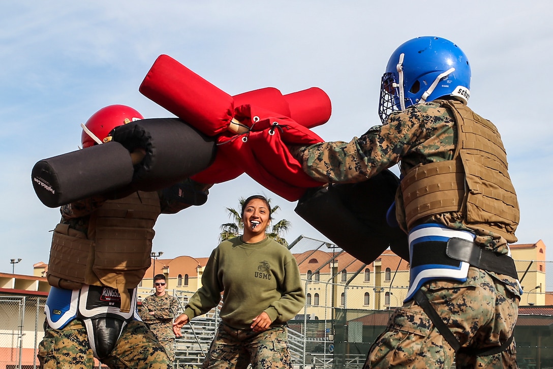 Marines participate in a pugil stick match during Marine Corps Martial Arts Program green belt training at Naval Air Station Sigonella, Italy, March 24, 2017. The Marines are assigned to the Special Purpose Marine Air-Ground Task Force Crisis Response – Africa logistics combat element. Marine Corps photo by Cpl. Samuel Guerra