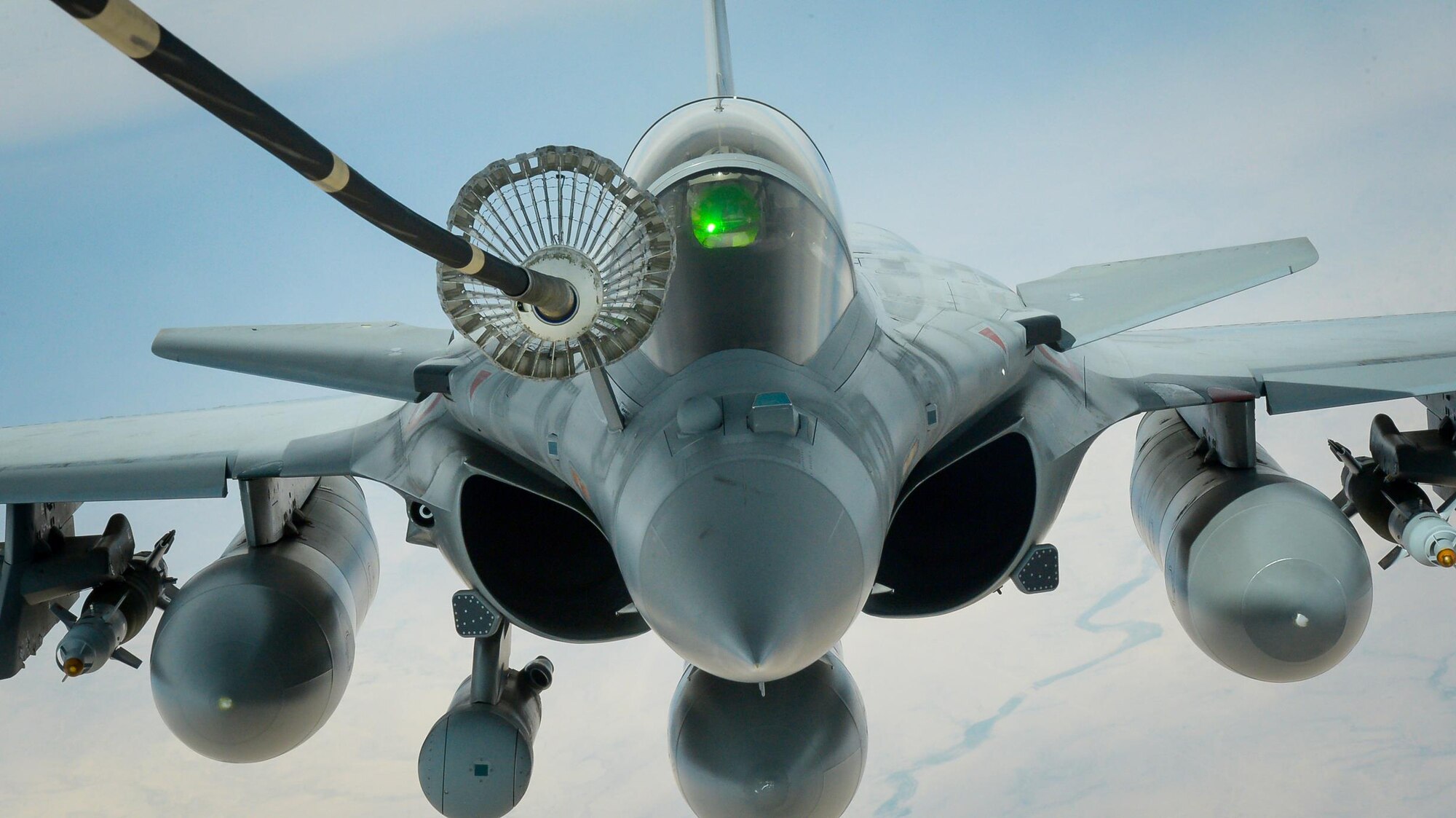 A French air force Dassault Rafale refuels from a U.S. Air Force KC-10 Extender from the 908th Expeditionary Air Refueling Squadron before conducting an aerial refuel during a Combined Joint Task Force - Operation Inherent Resolve mission March 20, 2017. The KC-10 provides aerial refueling capabilities for U.S. and coalition aircraft as they support Iraqi Security Forces and partnered forces as they work to liberate territory under the control of Islamic State of Iraq and Syria. (U.S. Air Force photo by Senior Airman Joshua A. Hoskins)