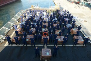 The Coast Guard Cutter James crew and a Helicopter Interdiction Tactical Squadron (HITRON) MH-65 Dolphin helicopter crew offload approximately 16 tons of cocaine Tuesday, March 28, 2017, in Port Everglades, Fla. Nearly 16 tons of cocaine were interdicted iworth an estimated $420 million wholesale seized in international waters off the Eastern Pacific Ocean. U.S. Coast Guard photo by Petty Officer 2nd Class Jonathan Lally