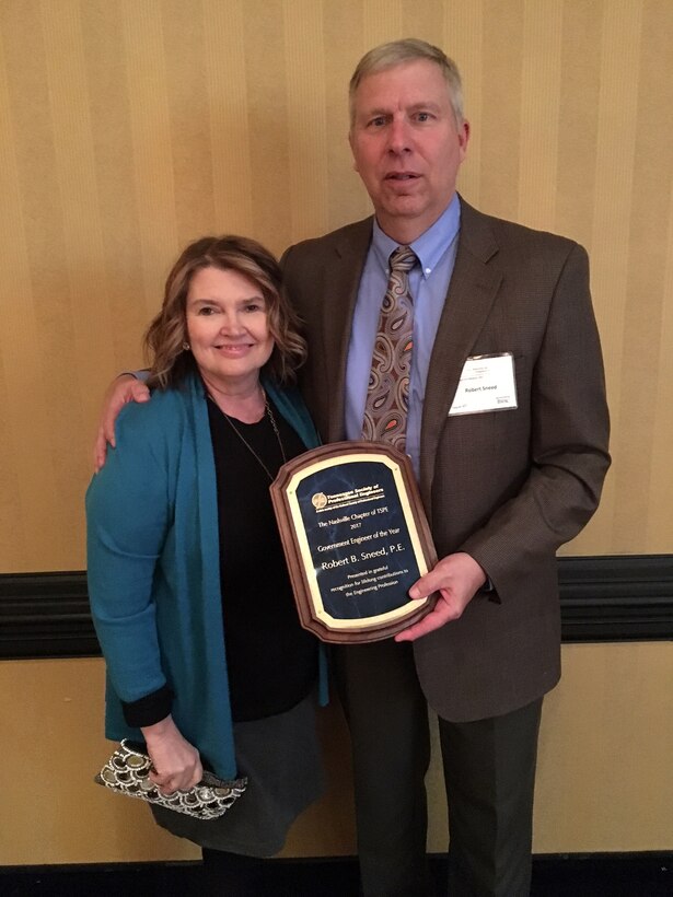 Bob Sneed, retired U.S. Army Corps of Engineers Nashville District Water Management Section chief, poses with his wife Cindy after being named Government Engineer of the Year by the Tennessee Society of Professional Engineers at a banquet Feb. 24, 2017 at the Renaissance Hotel in Nashville, Tenn. 