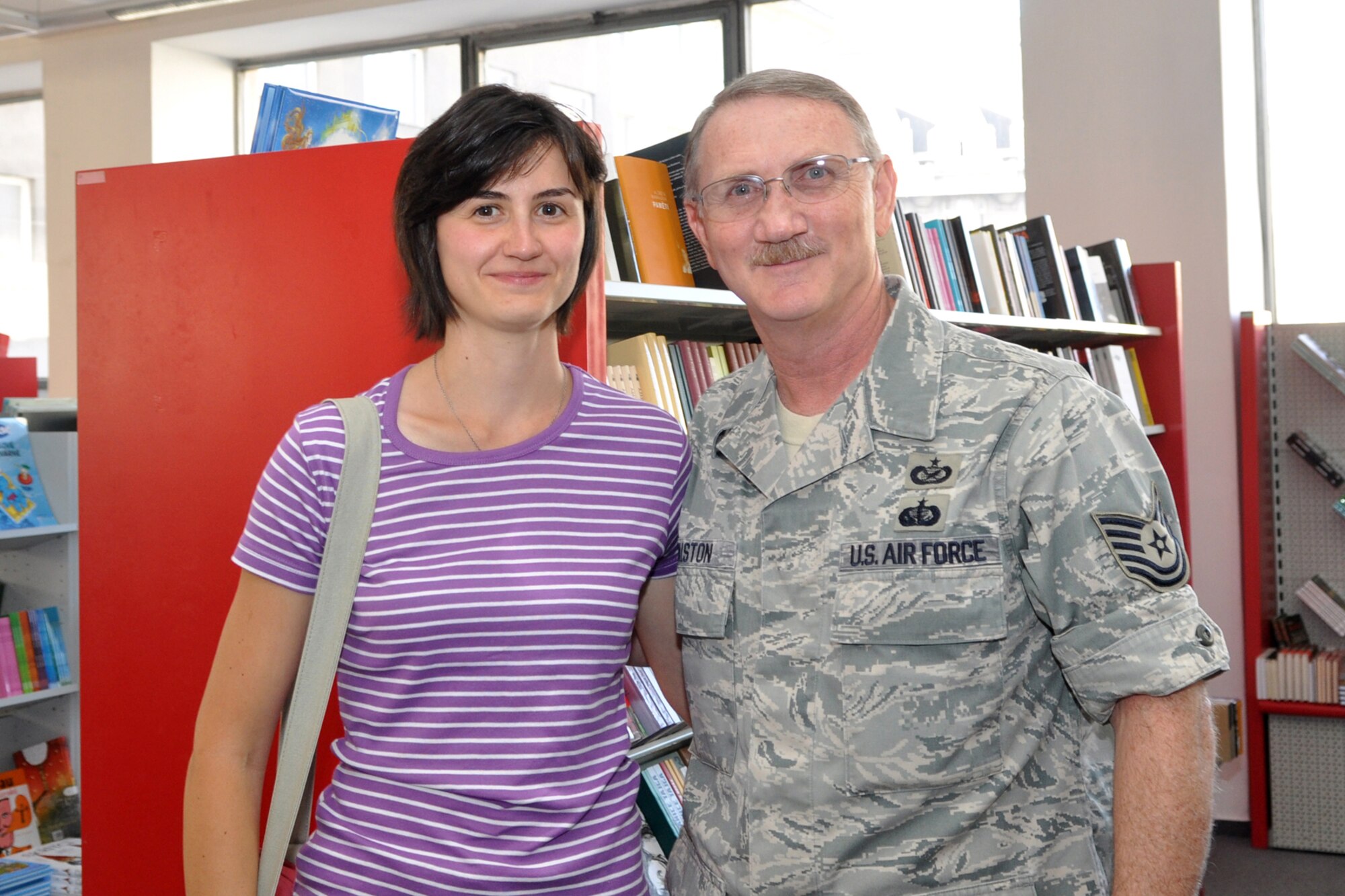 U.S. Air Force Reserve Tech Sgt. Jeff Walston and Eva Klimentova meet for the first time at a book store Sept. 23, 2011, in Ostrava, Czech Republic. Walston and Klimentova corresponded by email for nearly a year before Walston got the opportunity to travel to the Czech Republic during a visit of a B-52 Stratofortress to NATO Days, the biggest security show in Europe. (Courtesy photo)