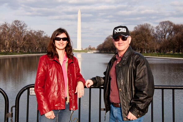 U.S. Air Force Reserve Master Sgt. Jeff and Eva Walston use the Washington Monument as a backdrop for a photo while on the National Mall in Washington, D.C., April 8, 2014. The couple’s visit to the Nation’s Capital acted as classroom preparing for her future Citizenship test. (Courtesy photo)