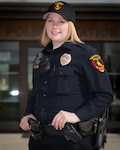 U.S. Air Force Staff Sgt. Rebekah Miller stands in front of the Torrington police department Mar. 10, 2017, in Torrington, Wyoming. Miller has been with the Wyoming Air National Guard for six years and is serving as a command post specialist. She has also been an officer with the Torrington police department for two years. 