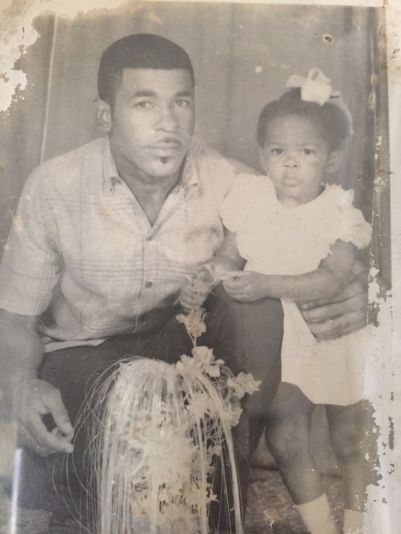 Claudia Lynch, age 3, poses with her father, Baron Lynch, while living in St. Anne’s, Jamaica. Lynch moved to The Bronx, N.Y., at age 13 to live with her mother, Norma Lynch. (Courtesy Photo)