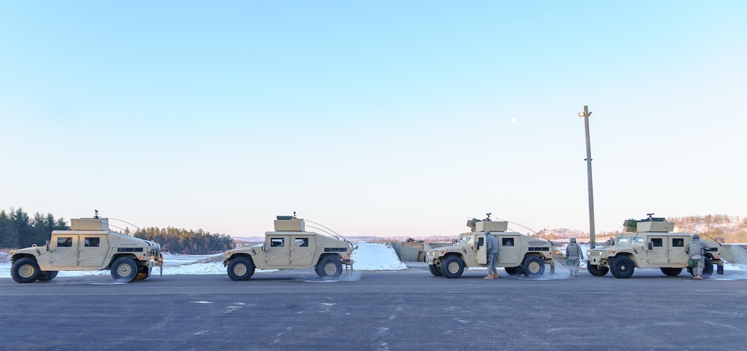 Humvees are staged to move to the blank fire range during Operation Cold Steel at Fort McCoy, Wis., March 15, 2017. Operation Cold Steel is the U.S. Army Reserve's crew-served weapons qualification and validation exercise to ensure that America's Army Reserve units and Soldiers are trained and ready to deploy on short-notice and bring combat-ready and lethal firepower in support of the Army and our joint partners anywhere in the world. (U.S. Army Reserve photo by Spc. Maurice Cheeks, 319th Medical Detachment)