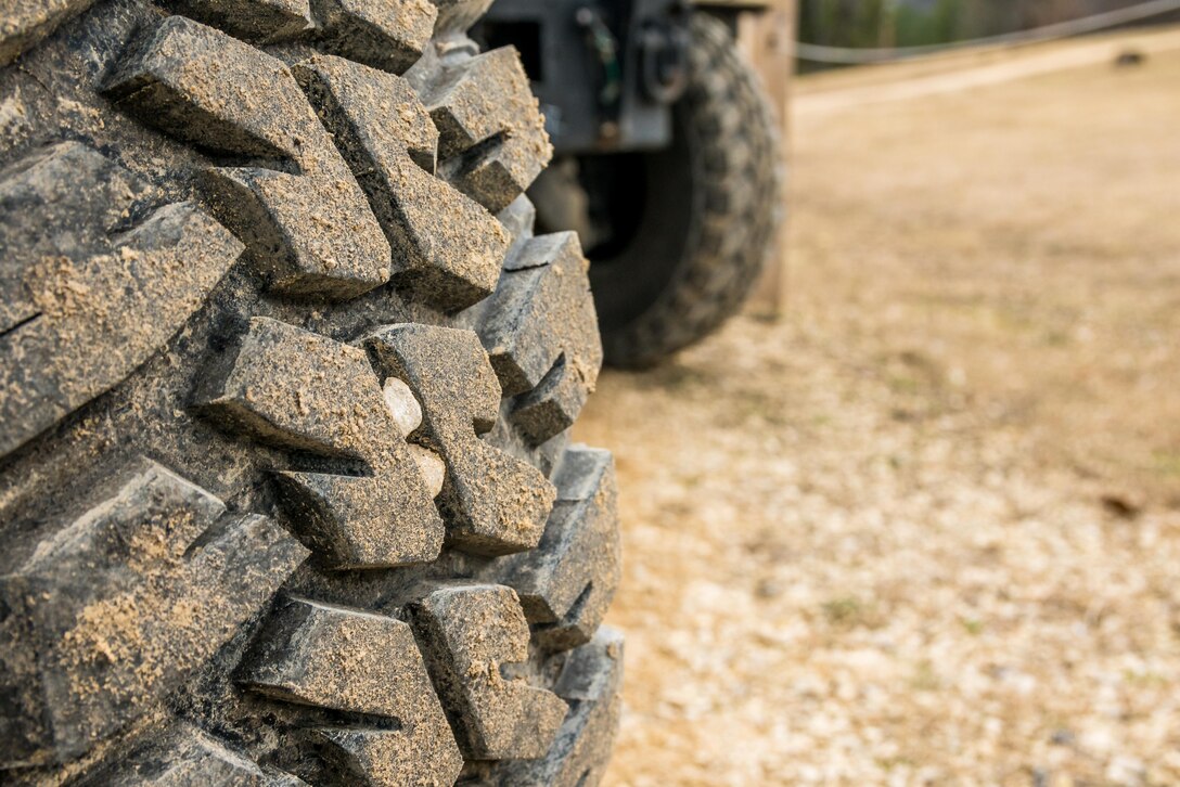 A dirty Humvee tire is stationary after rolling down the live-fire qualification range during Operation Cold Steel at Fort McCoy, Wis., March 18, 2017. Operation Cold Steel is the U.S. Army Reserve's crew-served weapons qualification and validation exercise to ensure that America's Army Reserve units and Soldiers are trained and ready to deploy on short-notice and bring combat-ready and lethal firepower in support of the Army and our joint partners anywhere in the world. (U.S. Army Reserve photo by Spc. Maurice Cheeks, 319th Medical Detachment)