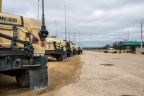 Vehicles are parked online in preparation for live-fire qualification during Operation Cold Steel at Fort McCoy, Wis., March 18, 2017. Operation Cold Steel is the U.S. Army Reserve's crew-served weapons qualification and validation exercise to ensure that America's Army Reserve units and Soldiers are trained and ready to deploy on short-notice and bring combat-ready and lethal firepower in support of the Army and our joint partners anywhere in the world. (U.S. Army Reserve photo by Spc. Maurice Cheeks, 319th Medical Detachment)