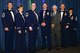 Fairchild leadership and Retired Lt. Col. Barry Bridger, a survivor of the “Hanoi Hilton” prison camp in Vietnam, pose for a photo with the newly selected Chief Master Sgts. Chad Madore and Shane Sweeney during the Chief Recognition Ceremony Mar. 25, 2017, at Fairchild Air Force Base, Washington. The ceremony consisted of a medallion and a candle lighting ceremony where they lit nine candles that represented each enlisted grade in the Air Force. (U.S. Air Force photo/Senior Airman Janelle Patiño)