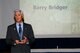 Retired Lt. Col. Barry Bridger, a survivor of the “Hanoi Hilton” prison camp in Vietnam, speaks with the audience about his experiences as a prisoner of war for six years during the Chief Recognition Ceremony Mar. 25, 2017, at Fairchild Air Force Base, Washington. Bridger was shot down over Son Tay, North Vietnam, by a surface-to-air missile and was captured by the North Vietnamese. (U.S. Air Force photo/Senior Airman Janelle Patiño)