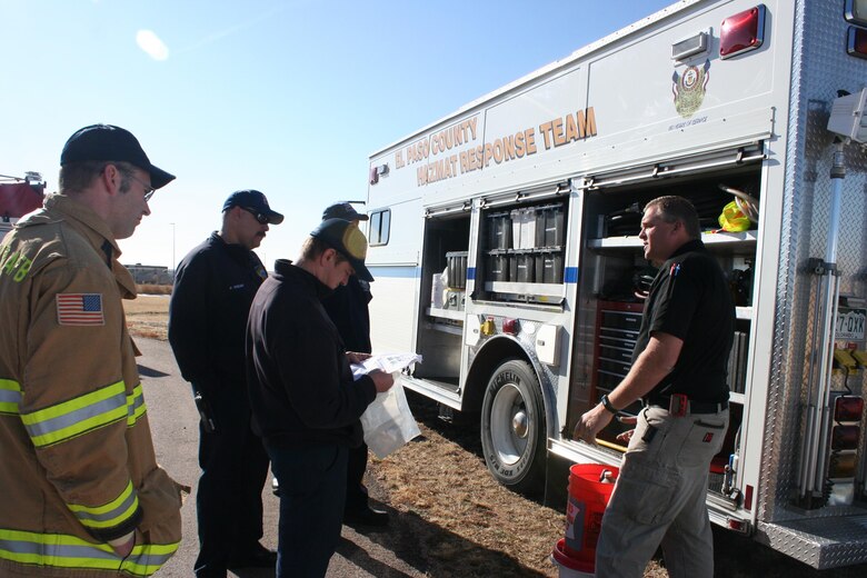 Schriever Fire Emergency Services firefighters inspect a vehicle during joint training at Schriever Air Force Base, Monday, March 27, 2017. The training focused on accomplishing job performance requirements to certify for the Hazmat technician level. (Courtesy photo)
