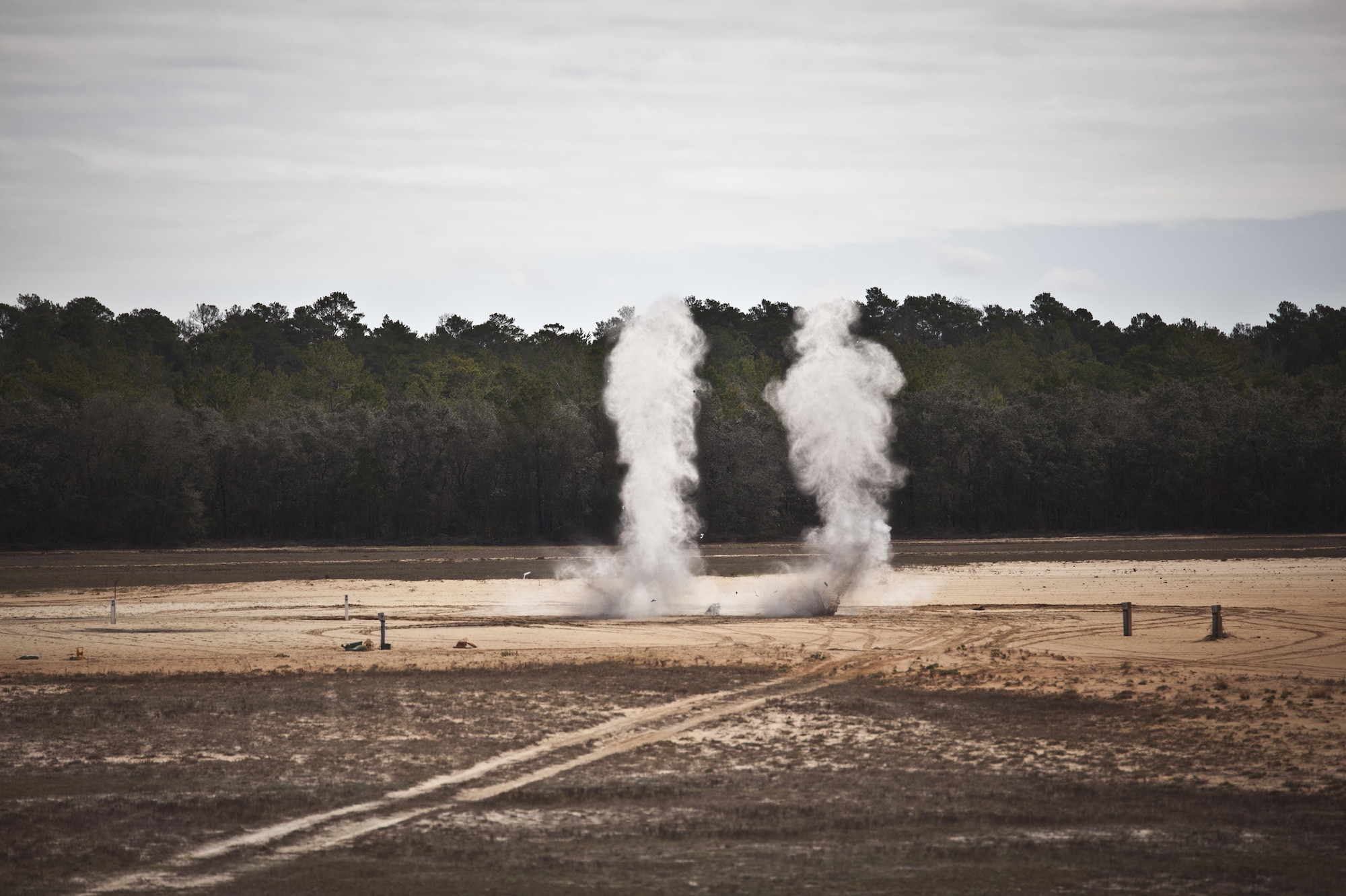 U.S. service members attending Naval School Explosive Ordnance Disposal (NAVSCOLEOD) conduct live fire explosive training at Eglin Air Force Base, Fla., March 8, 2017. The purpose of NAVSCOLEOD is to train technicians in basic, as well as advanced, courses to perform various duties that include locating, identifying, rendering safe, and disposing of bombs and other hazardous materials. (U.S. Marine Corps photo by Cpl. Laura Mercado)