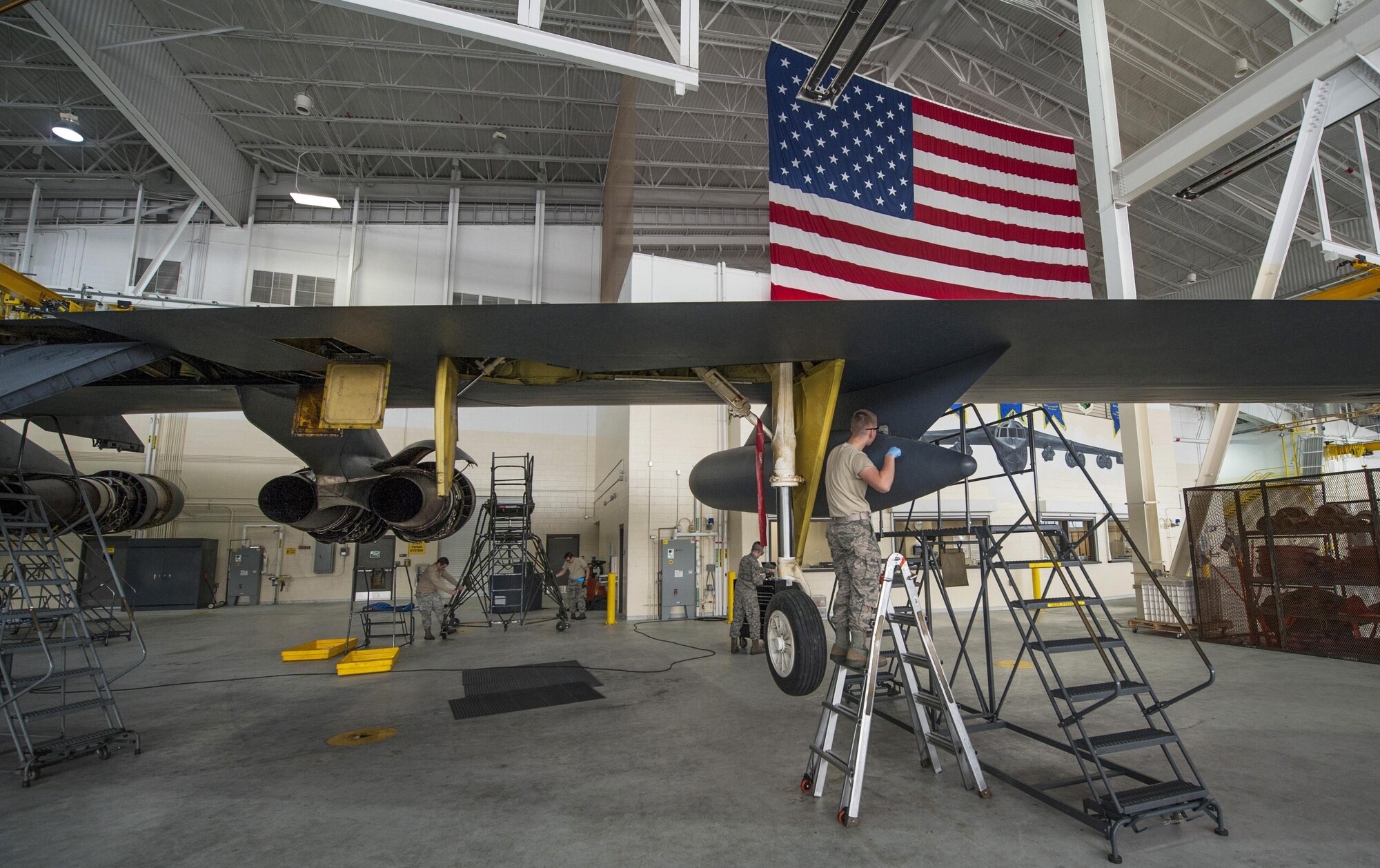 Crew chiefs with the 5th Maintenance Squadron perform B-52H Stratofortress maintenance at Minot Air Force Base, N.D., March 20, 2017. The 5th MXS “wrenchmen” crew chiefs perform an in-depth B-52H Stratofortress inspection after it has flown for 450 hours. (U.S. Air Force photo/Airman 1st Class Jonathan McElderry)