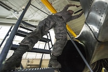 Staff Sgt. Michael Ward, 5th Maintenance Squadron crew chief, installs a panel gap strap at Minot Air Force Base, N.D., March 20, 2017. The 5th MXS “wrenchmen” crew chiefs perform an in-depth B-52H Stratofortress inspection after it has flown for 450 hours. (U.S. Air Force photo/Airman 1st Class Jonathan McElderry)