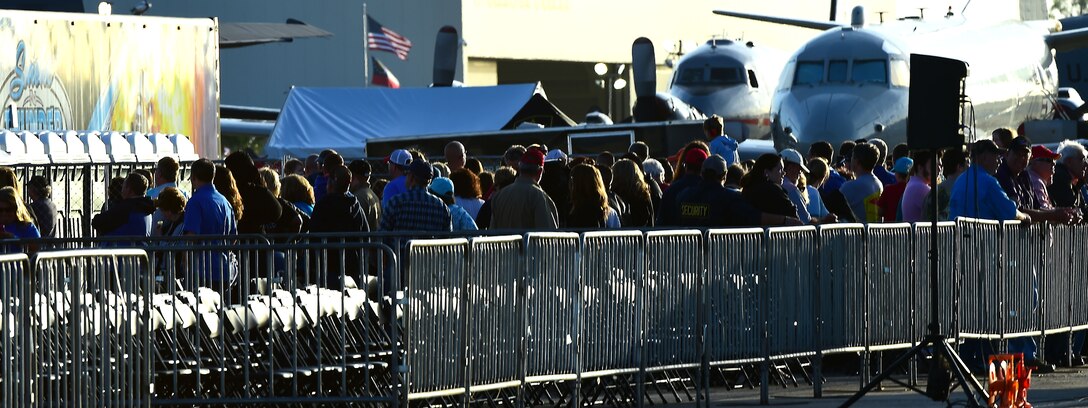 Spectators from the Wings Over Golden Isles Air Show watch as the F-22 Raptor performs a twilight show in Brunswick, Ga., March 24, 2017. During the twilight show, onlookers had the opportunity to see how different aircraft can perform during twilight hours. (U.S. Air Force photo/Senior Airman Kimberly Nagle)