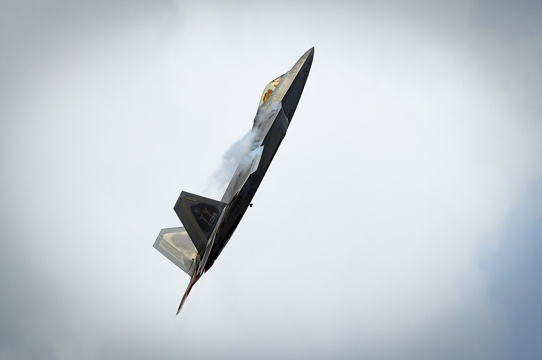 An F-22 Raptor performs during a demonstration at the Wings Over Golden Isles Air Show in Brunswick, Ga., March 24, 2017. The F-22 Raptor performed its maneuverable abilities three times during the air show, including a twilight display. (U.S. Air Force photo/Senior Airman Kimberly Nagle)
