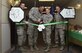 U.S. Air Force Col. Caroline M. Miller, 633rd Air Base Wing commander, and Tech. Sgt. Rasheem Cephas, 633rd Comptroller Squadron financial services NCO in charge, cut the ceremonial ribbon during the 633rd CPTS customer service reopening at Joint Base Langley-Eustis, Va., March 27, 2017. Lt. Col. Richard Atwell Jr., 633rd CPTS commander, and Chief Master Sgt. Kennon Arnold, 633rd ABW command chief, also joined in celebrating the reopening after relocating due to four months of renovations. (U.S. Air Force photo/Airman 1st Class Anthony Nin Leclerec)