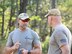 Special Tactics instructors discuss training objectives at the Fire and Pistol Club on Hurlburt Field, Fla., March 29, 2017. They produce mission-ready operators for the Air Force and United States Special Operations Command. (U.S. Air Force photo/Staff Sgt. Melanie Holochwost)