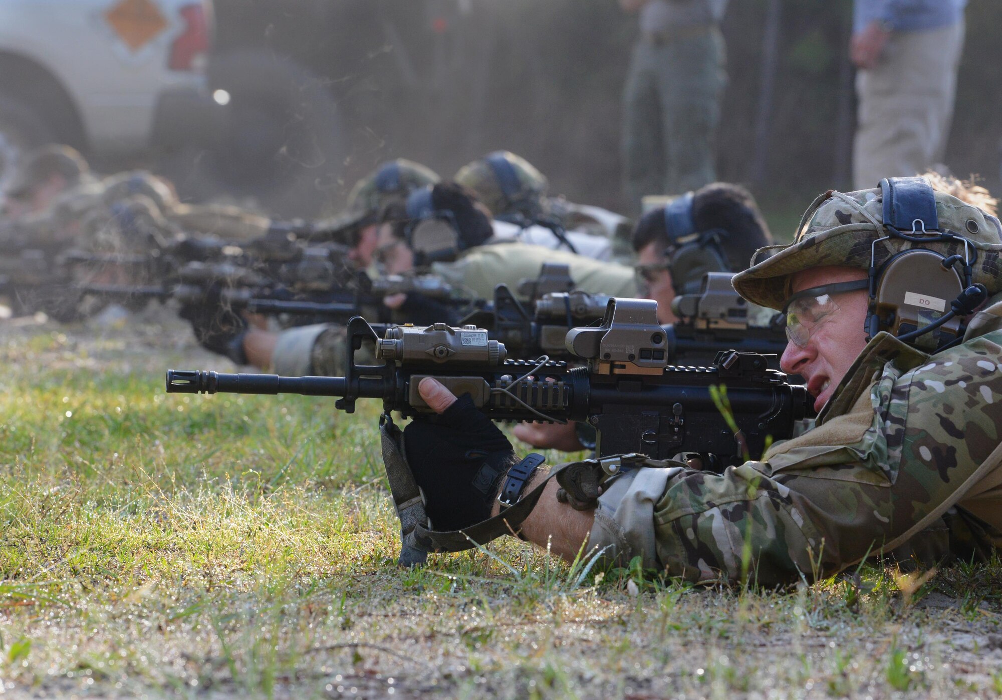 Combat controllers fire at their targets March 29, 2017 at the Fire and Pistol Club on Hurlburt Field, Fla. Their motto "First There," reaffirms their commitment to undertake the most dangerous missions. (U.S. Air Force photo/Staff Sgt. Melanie Holochwost)