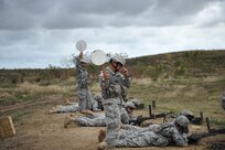 1st Mission Support Command Soldiers, Master Sgt. Ivan Lopez and Sgt. Miriam Quinones give the "all clear" to commence firing the M240B during a crew serve weapons range on Camp Santiago, Puerto Rico, March 25. The purpose of the range was for Soldiers to familiarize themselves and qualify with their assigned crew serve weapons. A total of 78 Soldiers from the 1st Mission Support Command qualified with their assigned weapons and have increased their unit readiness levels.