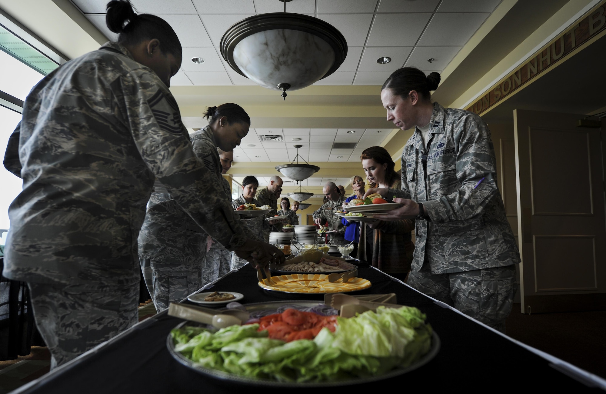 Air Commandos gather at a luncheon at Hurlburt Field, Fla., March 23, 2017. The 1st Special Operations Wing held a luncheon in honor of Women's History Month which was established in 1987 by Congress after being petitioned by the National Women’s History Project. (U.S. Air Force photo by Airman 1st Class Dennis Spain)