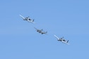 Two U.S. Air Force A-10C Thunderbolt IIs, assigned to the 354th Fighter Squadron and a part of the A-10 West Heritage Flight Team, and a P-38 Lightning fly in formation during the Los Angeles County Air Show in Lancaster, Calif., March 26, 2017. This is the team’s first air show performance after nearly five years of disbandment. (U.S. Air Force photo by Airman 1st Class Mya M. Crosby)