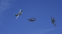 Two U.S. Air Force A-10C Thunderbolt IIs, assigned to the 354th Fighter Squadron and a part of the A-10 West Heritage Flight Team, and a P-38 Lightning break away after flying in formation during the Los Angeles County Air Show in Lancaster, Calif., March 26, 2017. The A-10 WHFT is scheduled to perform in 9 more air shows throughout the U.S. this year after resurging from a 5-year-long inactivation period. (U.S. Air Force photo by Airman 1st Class Mya M. Crosby)