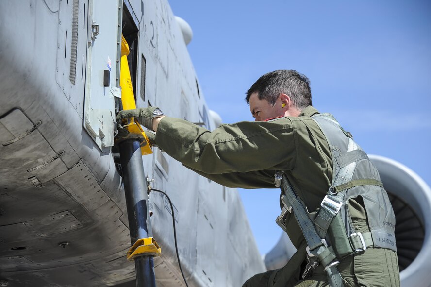 U.S. Air Force Maj. Daniel Levy, A-10 West Heritage Flight Team and 357th Fighter Squadron pilot, climbs out of an A-10C Thunderbolt II during the Los Angeles County Air Show in Lancaster, Calif., March 26, 2017. The A-10 WHFT is scheduled to perform in 9 more air shows throughout the U.S. this year after resurging from a 5-year-long inactivation period. (U.S. Air Force photo by Airman 1st Class Mya M. Crosby)