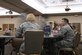 Airmen move to their next mentor during The Top 3 speed mentoring event, March 23, 2017 at Moody Air Force Base, Ga. The event gave NCOs the opportunity to ask for advice and guidance from Senior NCOs in a variety of career fields on base. NCOs were encouraged to bring paperwork or supporting documents to give SNCOs more resources to try to help. (U.S. Air Force photo by Airman 1st Class Janiqua P. Robinson)
