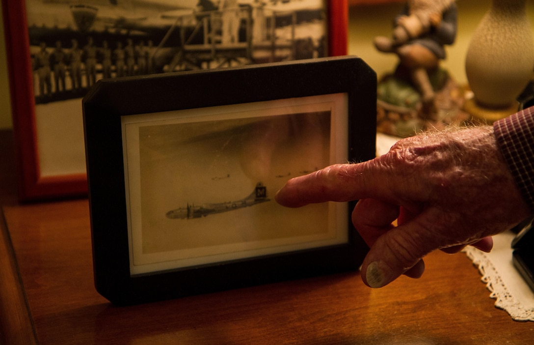 William Dellinger, a 96-year-old veteran and native of Charlotte North Carolina. reminisces on events during WWII, things he’s seen and the life he has lead, at his home Wednesday, Nov 2. Dellinger talks about his experiences and shows his WWII memorabilia. Photo depicts one of the first planes flown by Dellinger. (U.S. Army Photo by Spc. Tynisha Daniel, 108th Training Command)