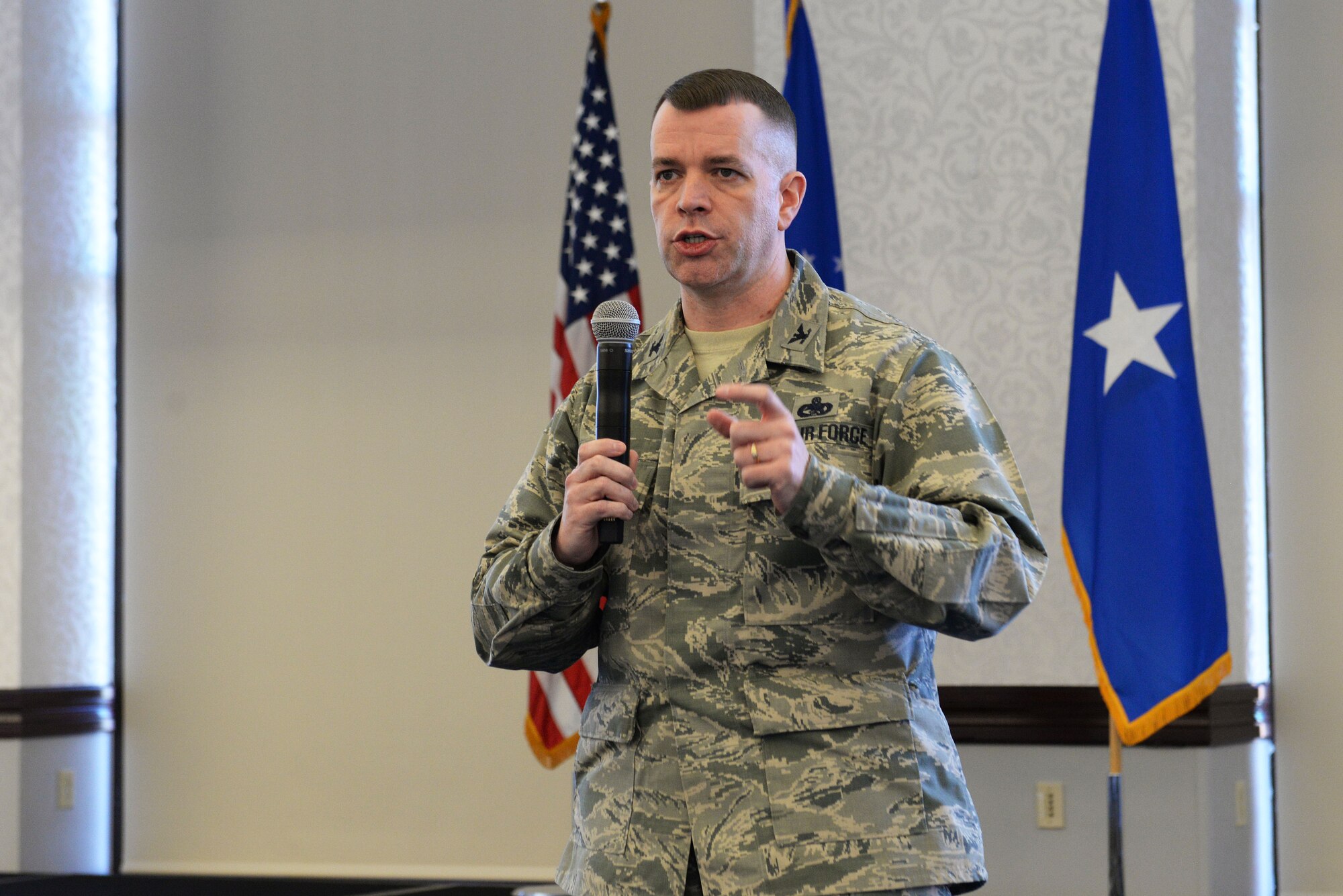 Col. David Sanford, 635th Supply Chain Operations Wing commander, answers questions during a logistics summit at Scott Air Force Base March 22.  The two-day summit brought around 200 logistics commanders and senior leaders from all over the world together to work on  better ways to improve current ways of operations. (U.S. Air Force photo by Tech. Sgt. Maria Castle)