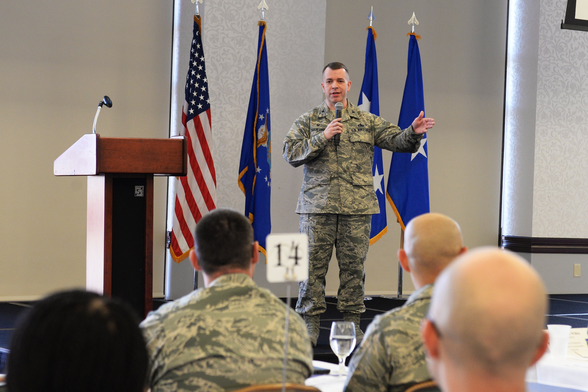 Col. David Sanford, 635th Supply Chain Operations Wing commander, talks about the SCOW organizational chart March 21 at the Scott Event Center.  He showed how to better utilize the logistics readiness agencies to be successful in executing their missions. The 635th SCOW hosted a 2-day logistics summit, which brought together logistics readiness leaders from different commands so they could learn from each other about how to better their procedures and processes.  (U.S. Air Force photo by Tech. Sgt. Maria Castle)