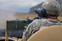 U.S. Army Reserve Spc. Dalton Phillips, 979th Mobility Augmentation Company, 478th Engineer Battalion, 926th Engineer Brigade, 412th Theater Engineer Command, based in Lexington, Ky., engages a target with his M2 .50 caliber machine gun during a Gunnery crew live-fire qualification at Wilcox Range on Fort Knox, Ky., March 28, 2017. This is the first time that this company has fired its M2s and M240B Machine Guns from M113 Armored Personnel Carriers. This training ensures that Army Reserve units and Soldiers bring combat-ready and lethal firepower to worldwide operations. (U.S. Army Reserve Photo by Sgt. 1st Class Clinton Wood)