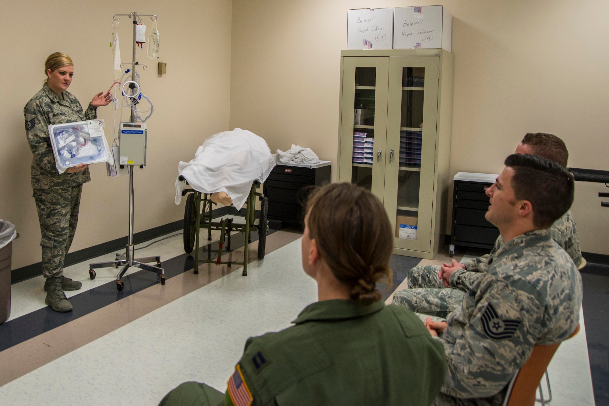 Tech. Sgt. Emily Irwin-Green, St. Louis Center for Sustainment of Trauma and Rediness Skills emergency and trauma nursing instructor, discusses the uses of various medical euipment during a C-STARS course in St. Louis Missiouri, March 20, 2017. Irwin-Green said her favorite part of the job is seeing the confidence in her students grow while providing them the skills needed to potentially save the lives of her brothers and sisters-in-arms. (U.S. Air Force Photo by Airman 1st Class Daniel Garcia)