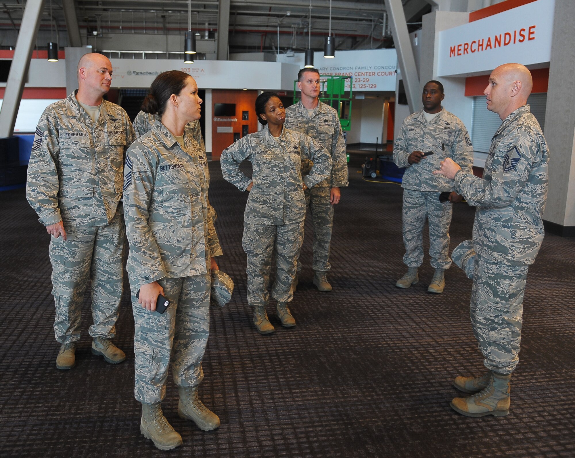 Master Sgt. Matthew Garner, right, NCO in charge of personnel assigned to Air Force ROTC Detachment 150 from Gainesville, Fla., speaks with Team MacDill senior NCOs during a tour of the University of Florida’s athletic facilities, March 28, 2017. Detachment 150 invited senior NCOs from MacDill to give advice and mentorship to the ROTC cadets. (U.S. Air Force photo by Airman 1st Class Adam R. Shanks)