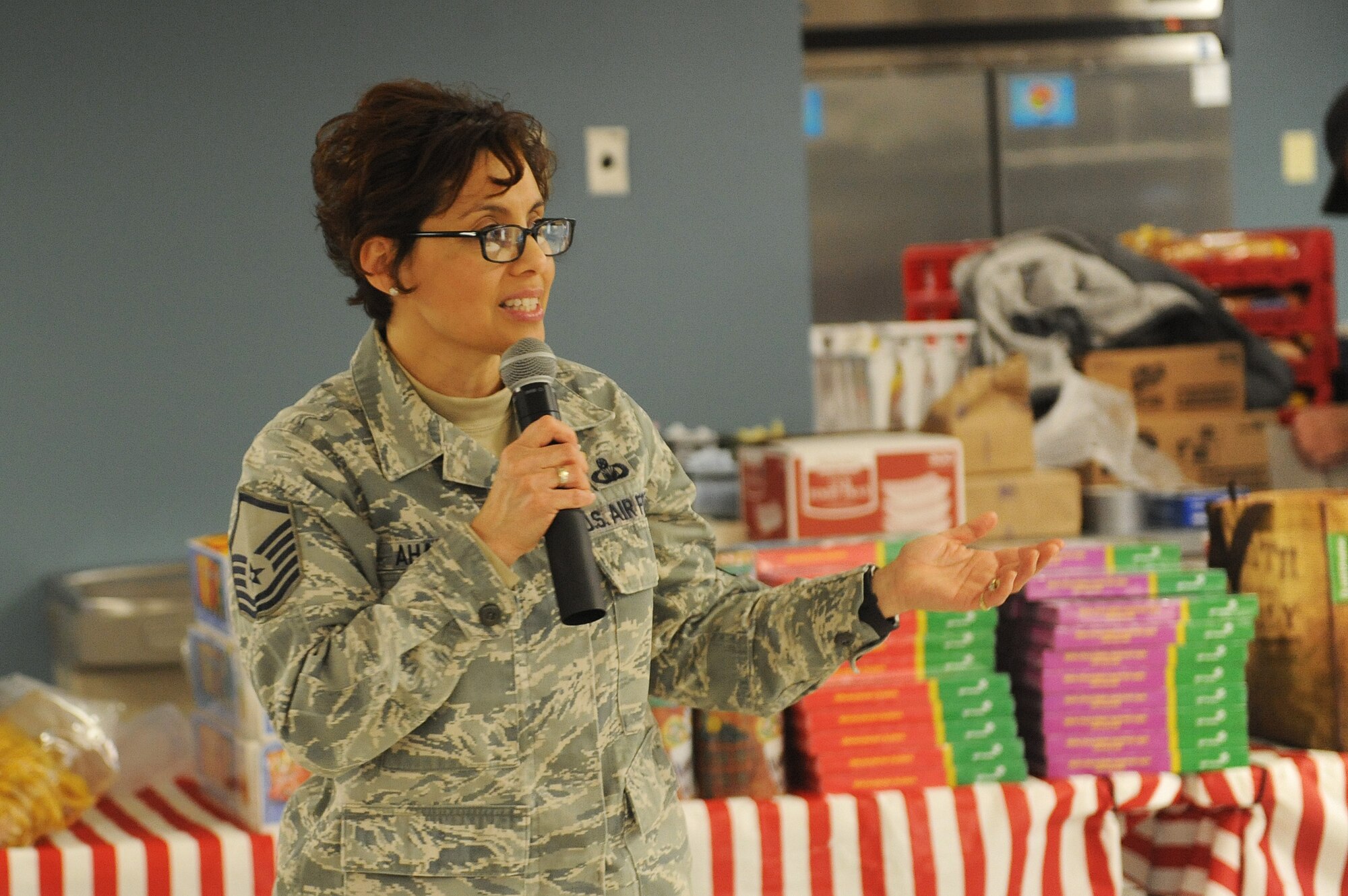 Master Sgt. Esmeralda Aharon, 375th Air Mobility Wing Chapel superintendent, kicks off a women's resiliency fair at Scott Air Force Base March 23. Attendees met with professionals from organizations with a focus on women's issues, including women's health, The Lean-In Circle of Scott AFB, Green Dot, Sexual Assault Prevention and Resonse Office, and 375th Legal Office. (U.S. Air Force photo by Tech. Sgt. Maria Castle)