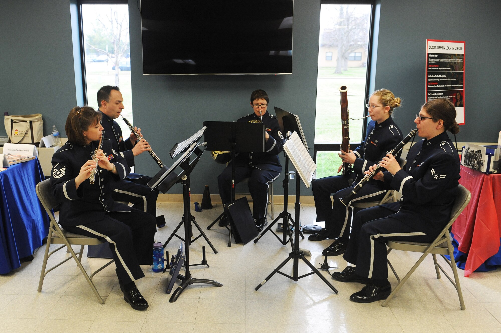 The Band of Mid-America plays music during a women's resliency fair March 23 at Scott Air Force Base. The musicians provided entertainment for the duration of the two-hour event, playing a variety of songs, including the National Anthem and the Air Force Song. (U.S. Air Force photo by Tech. Sgt. Maria Castle)