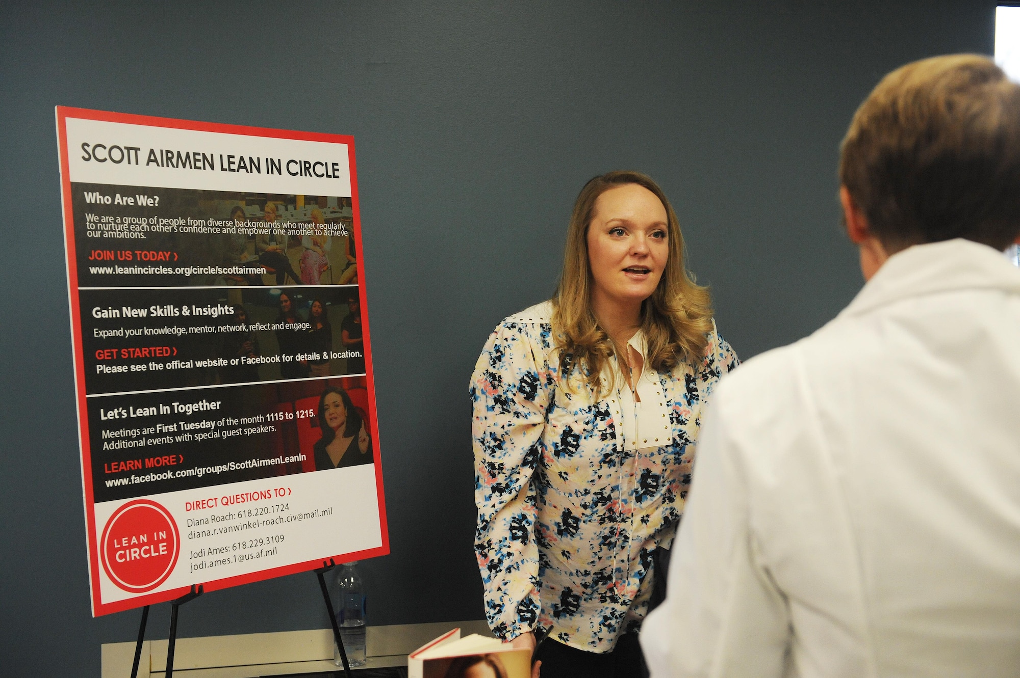 Jodi Ames, Air Mobility Command Public Affairs specialist, introduces a guest to the Lean-In Circle of Scott Air Force Base organization during a women's resiliency fair at the base chapel March 23. The Lean-In Circle is a group of diverse women who get together to network and learn from each other, while sharing their own personal experience. (U.S. Air Force photo by Tech. Sgt. Maria Castle)