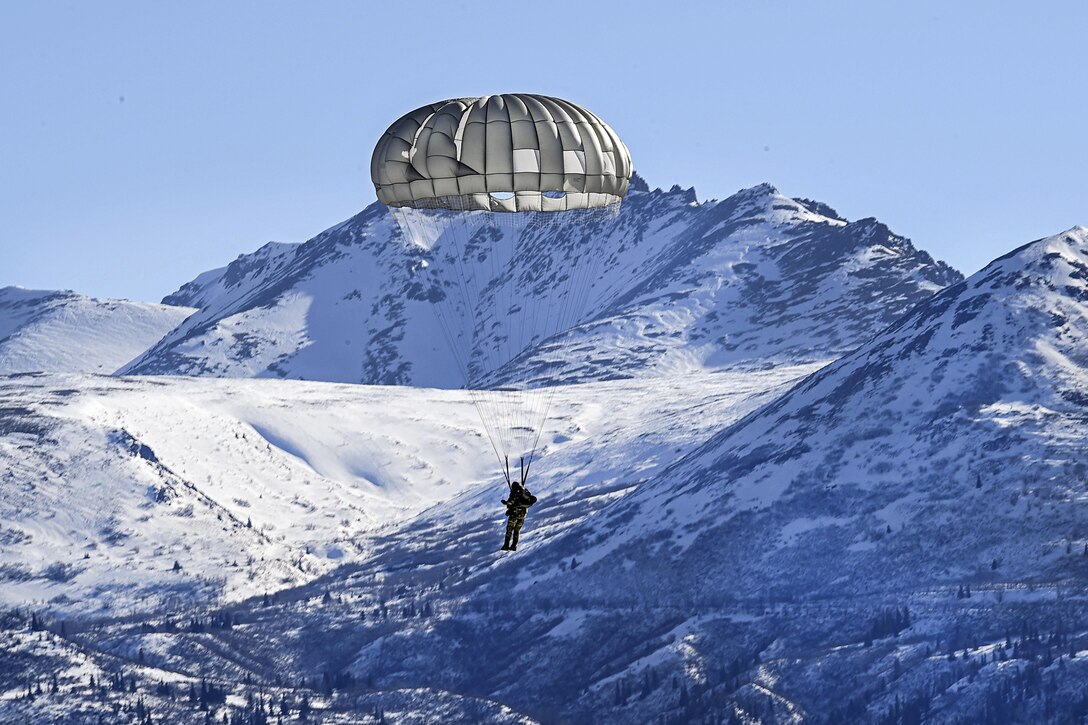 An airman prepares to land during parachute training at Joint Base Elmendorf-Richardson, Alaska, March 22, 2017. The airman is assigned to the 3rd Air Support Operations Squadron. Routine training helps airmen maintain proficiency and train for missions. Air Force photo by Airman 1st Class Valerie Monroy