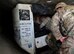 U.S. Airmen from the 355th Civil Engineer Squadron’s Explosive Ordnance Disposal flight search for an improvised explosive device in the cargo hold of a large aircraft during the Raven's Challenge XI Interoperability Exercise at Pinal Airpark in Marana, Ariz., March 21, 2017. The main focus of the exercise was to utilize interagency tactics to counteract IEDs in realistic stateside and overseas operational scenarios. (U.S. Air Force photo by Airman 1st Class Nathan H. Barbour)