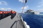 The forward-deployed Arleigh Burke-class guided-missile destroyer USS Fitzgerald (DDG 62) maneuvers alongside the Military Sealift Command dry cargo and ammunition ship USNS Cesar Chavez (T-AKE 14) during a replenishment-at-sea, Mar. 24, 2017. Fitzgerald is on patrol in the South China Sea supporting security and stability in the Indo-Asia-Pacific region. 