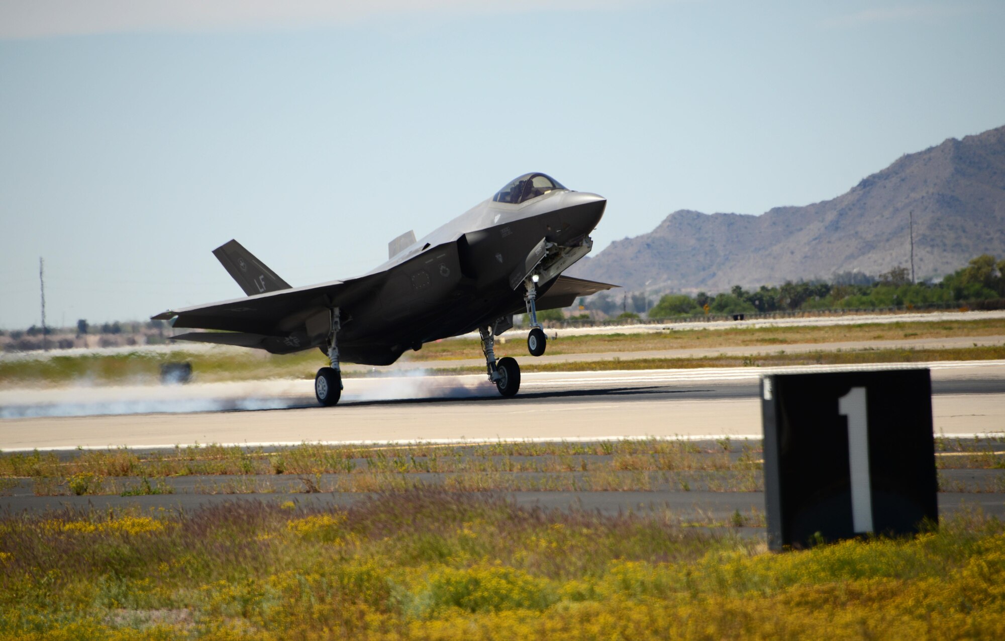 Lt. Col. Robert Miller, 62nd Fighter Squadron pilot, lands the 10,000th F-35 Lightning II training sortie at Luke Air Force Base, Ariz March 29, 2017. The 5,000th training sortie was flown in May 2015 marking more than 5,000 sorties flown in 10 months as Luke continues to build the future of air power. (U.S. Air Force photo by Airman 1st Class Alexander Cook)  